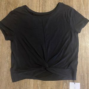 Zyia twist in the front crop top.